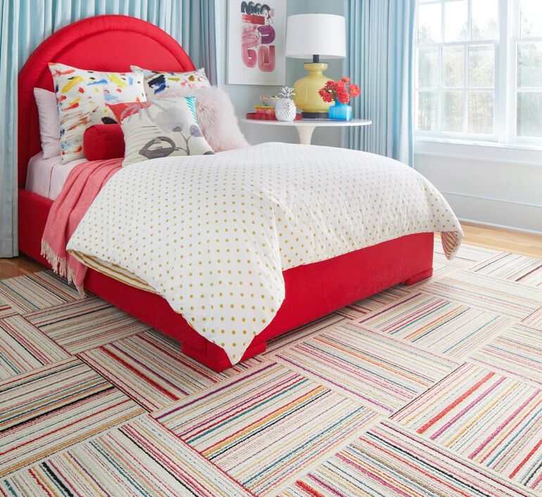 Bedroom with FLOR Like Minded area rug shown in Pink